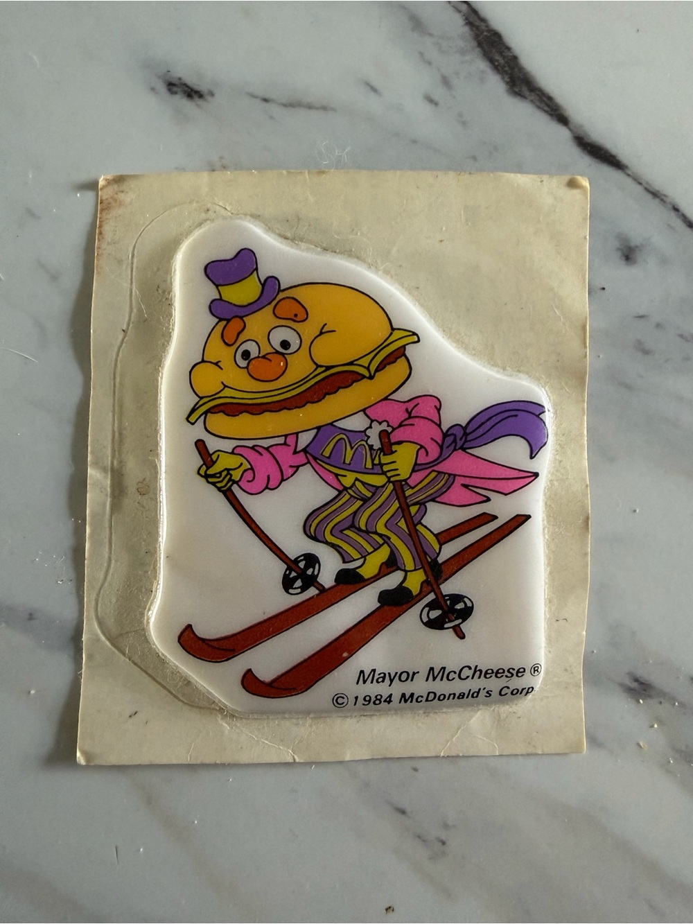 McDonald's Mayor McCheese Skiing Sticker 1984 vintage— Yellow, Pink, Purple
